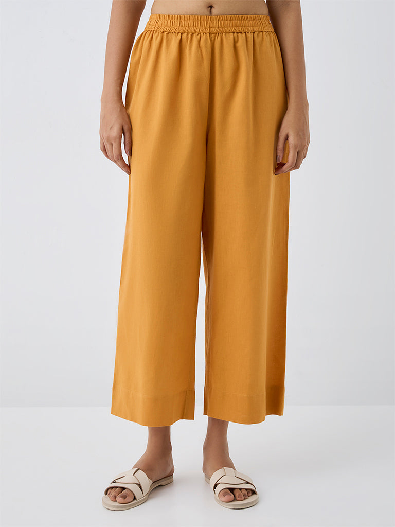 Utsa Orange Solid Cotton-Blend Pants