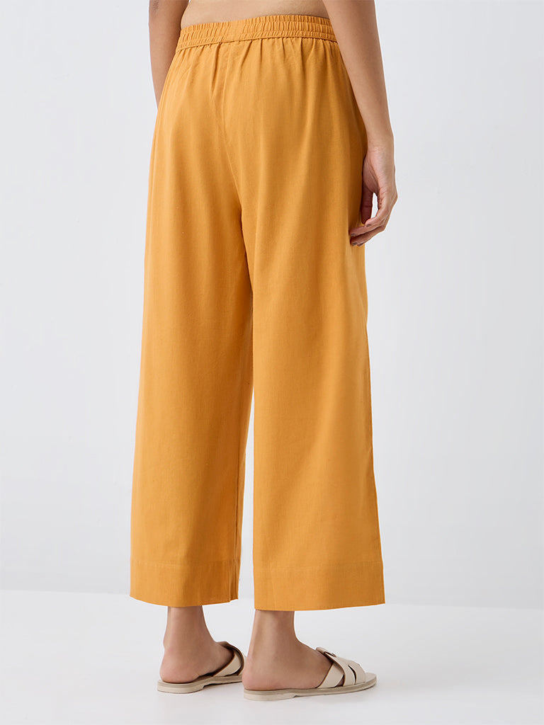 Utsa Orange Solid Cotton-Blend Pants