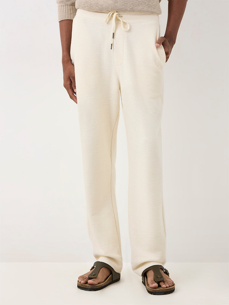 ETA Off-White Textured Relaxed-Fit Mid-Rise Cotton-Blend Chinos