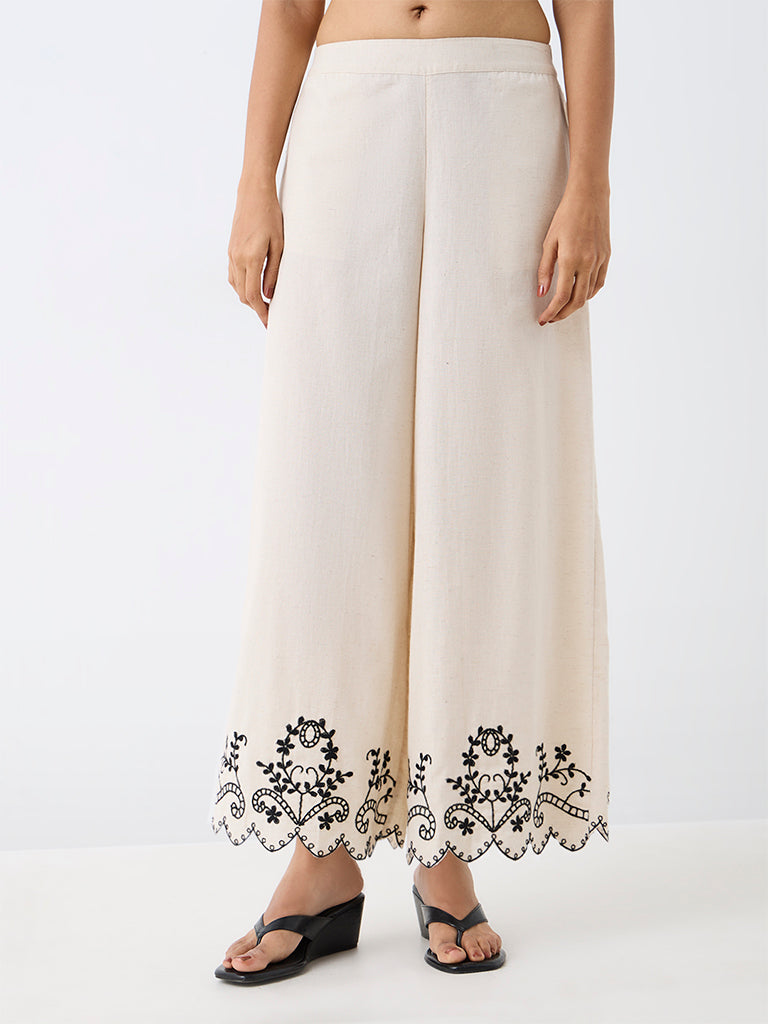 Utsa Beige Floral Embroidered Cotton-Blend Pants