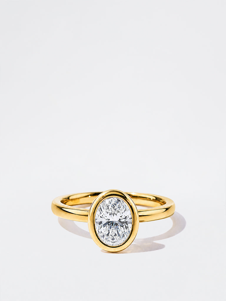 Gold Oval Bezel Lab Diamond Solitaire Ring