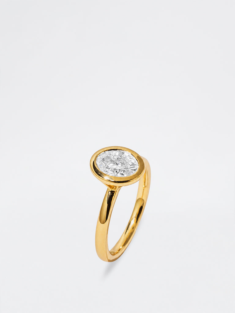 Gold Oval Bezel Lab Diamond Solitaire Ring