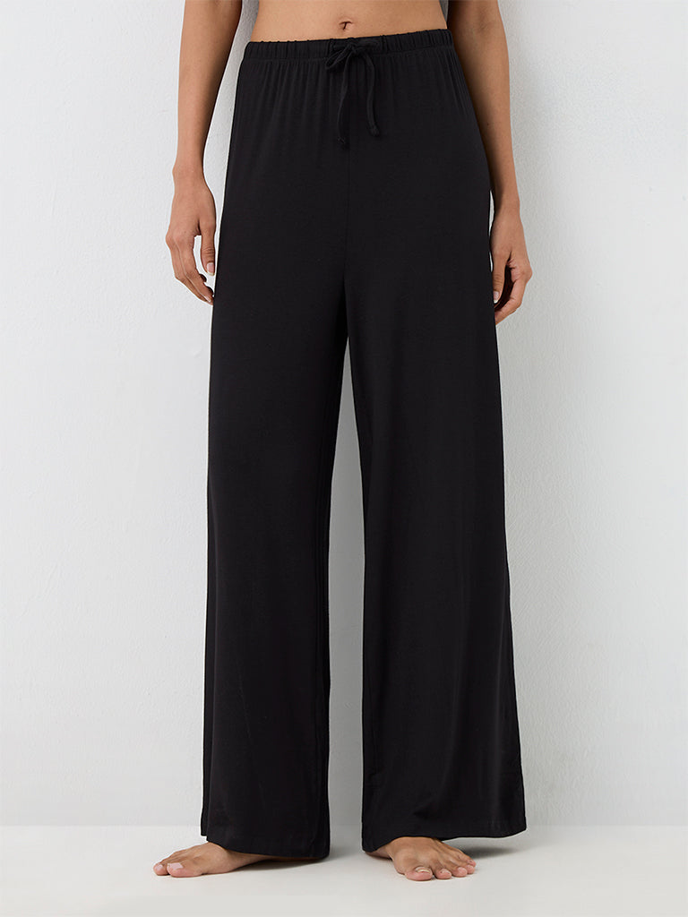 Superstar Black Solid High-Rise Pants