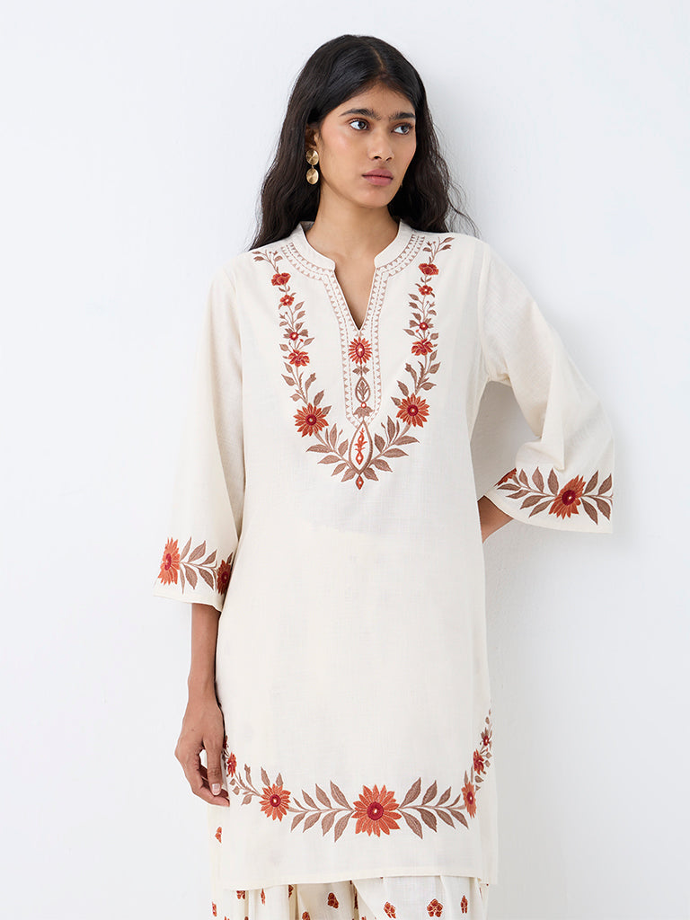 Utsa Off-White Floral Embroidered A-Line Kurta.