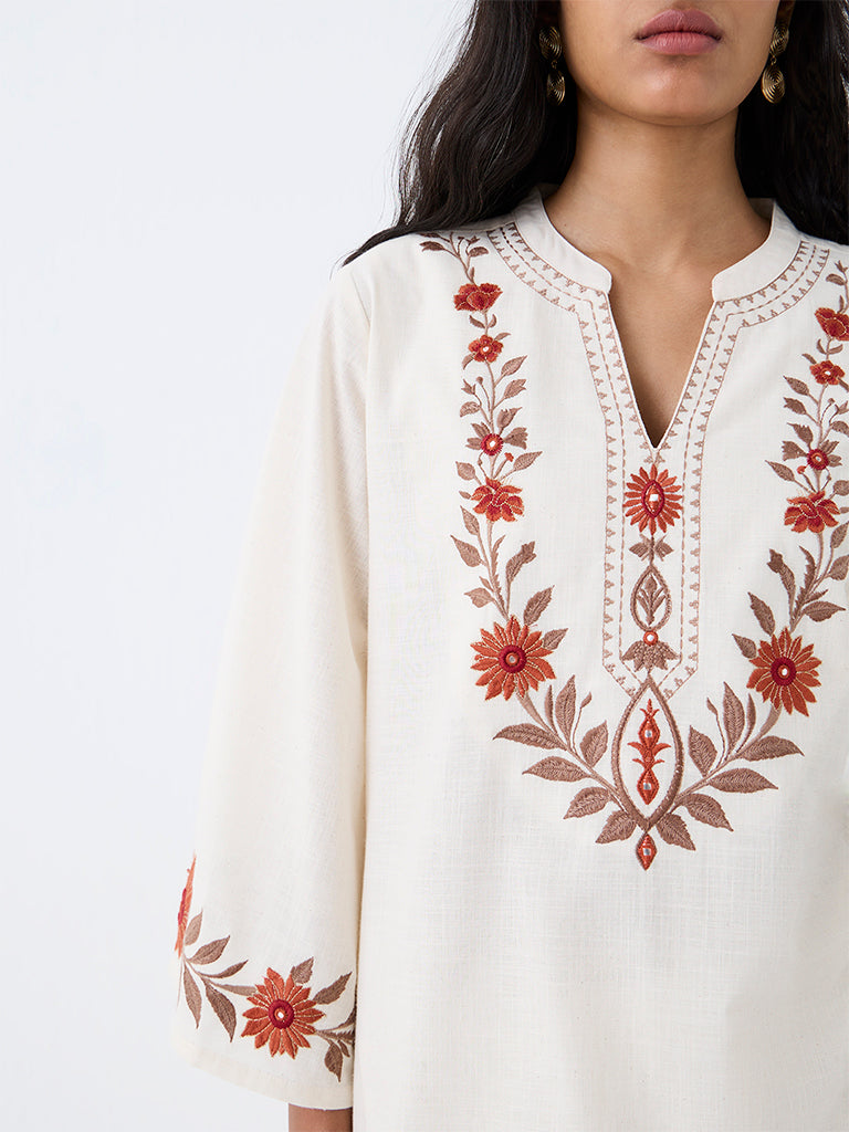 Utsa Off-White Floral Embroidered A-Line Kurta.