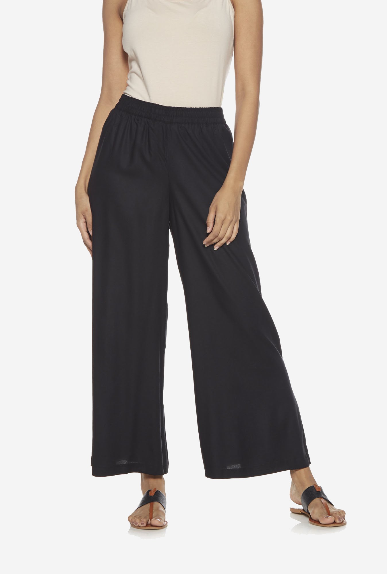 Utsa Black Solid Palazzos for women full view - Westside