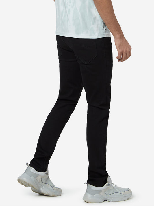 Nuon Black Nuo-Flex Hendrix Slim Fit Jeans | Black Slim Fit Jeans for men side view - Westside