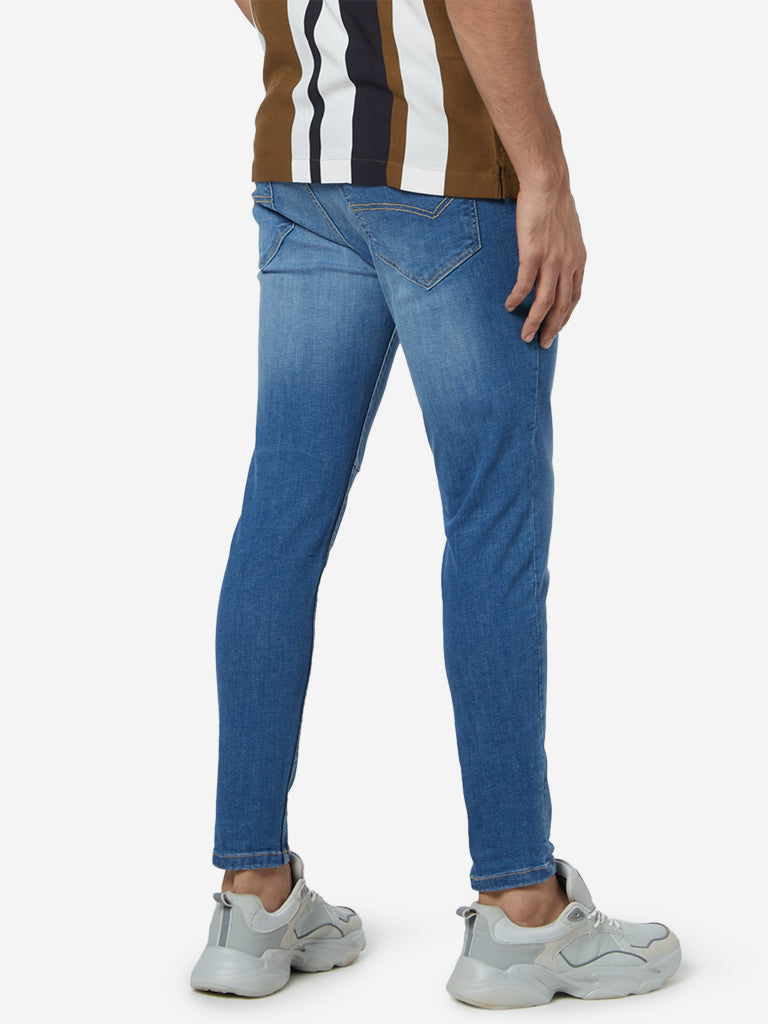 Nuon Blue Nuo-Flex Rodeo Carrot Fit Jeans | Nuon Blue Nuo-Flex Rodeo Carrot Fit Jeans for Men Back View - Westside