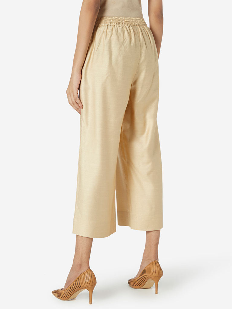 Zuba Beige Slim Fit Cropped Palazzos | Beige Slim Fit Cropped Palazzos for women back view - Westside