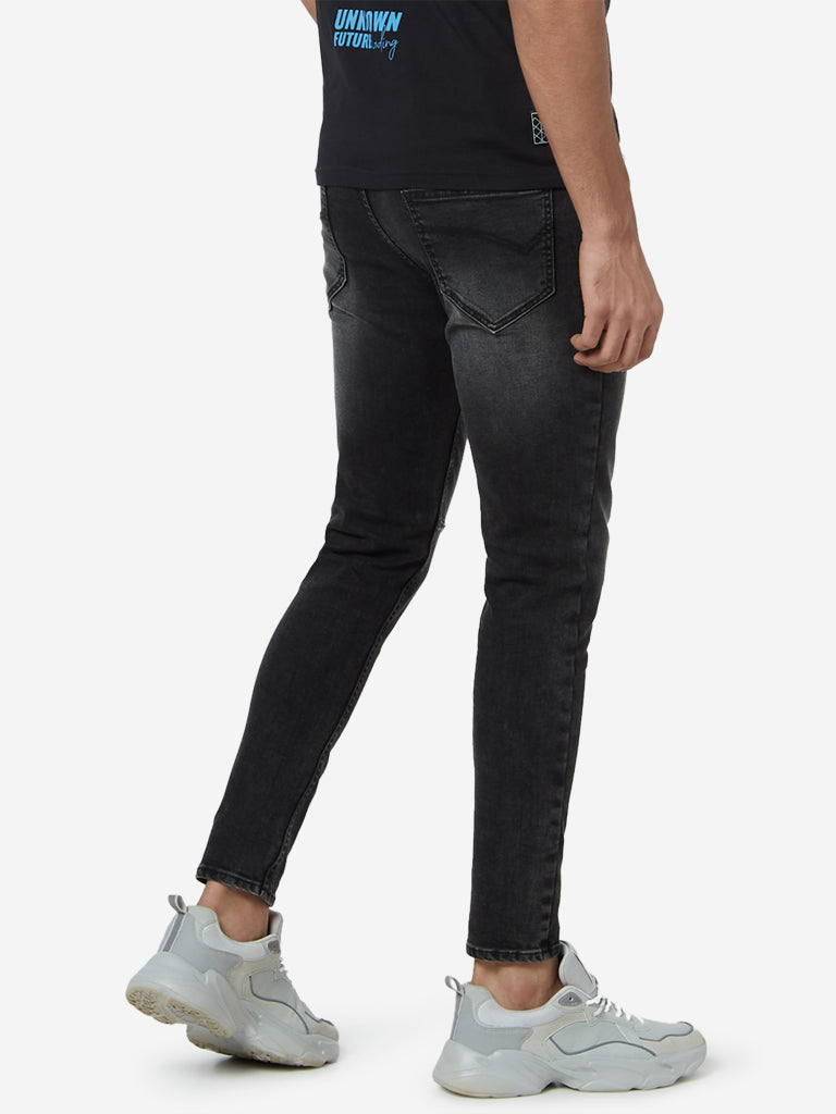 Nuon Charcoal Nuo-Flex Rodeo Carrot Fit Jeans | Charcoal Nuo-Flex Rodeo Carrot Fit Jeans for Men Back View - Westside