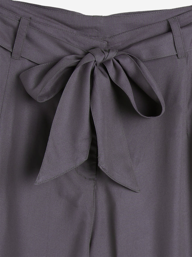Bombay Paisley Dark Grey Palazzos with Belt | Dark Grey Palazzos with Belt for women close up view - Westside