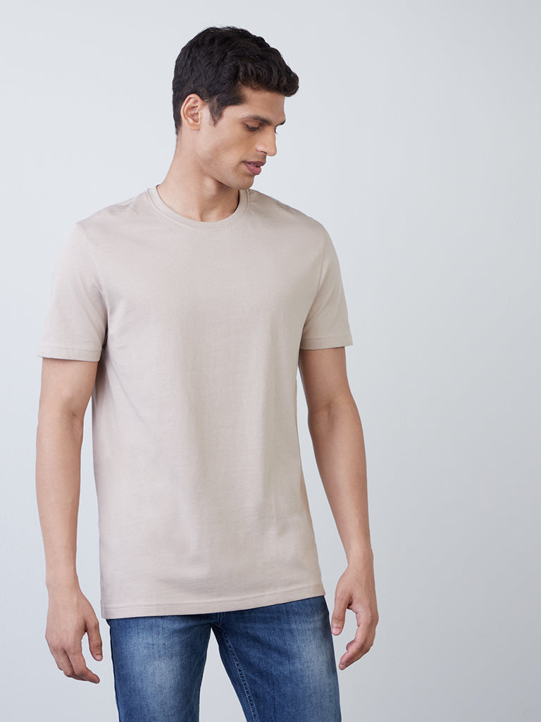 WES Casuals Beige Slim-Fit T-Shirt | Beige Slim-Fit T-Shirt for Men Front View - Westside