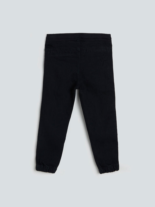 Buy Y&F Solid Black Ribbed Joggers from Westside
