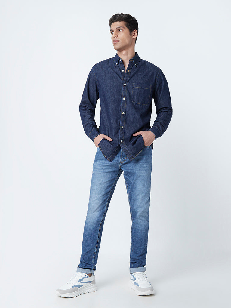 dark blue shirt and blue jeans
