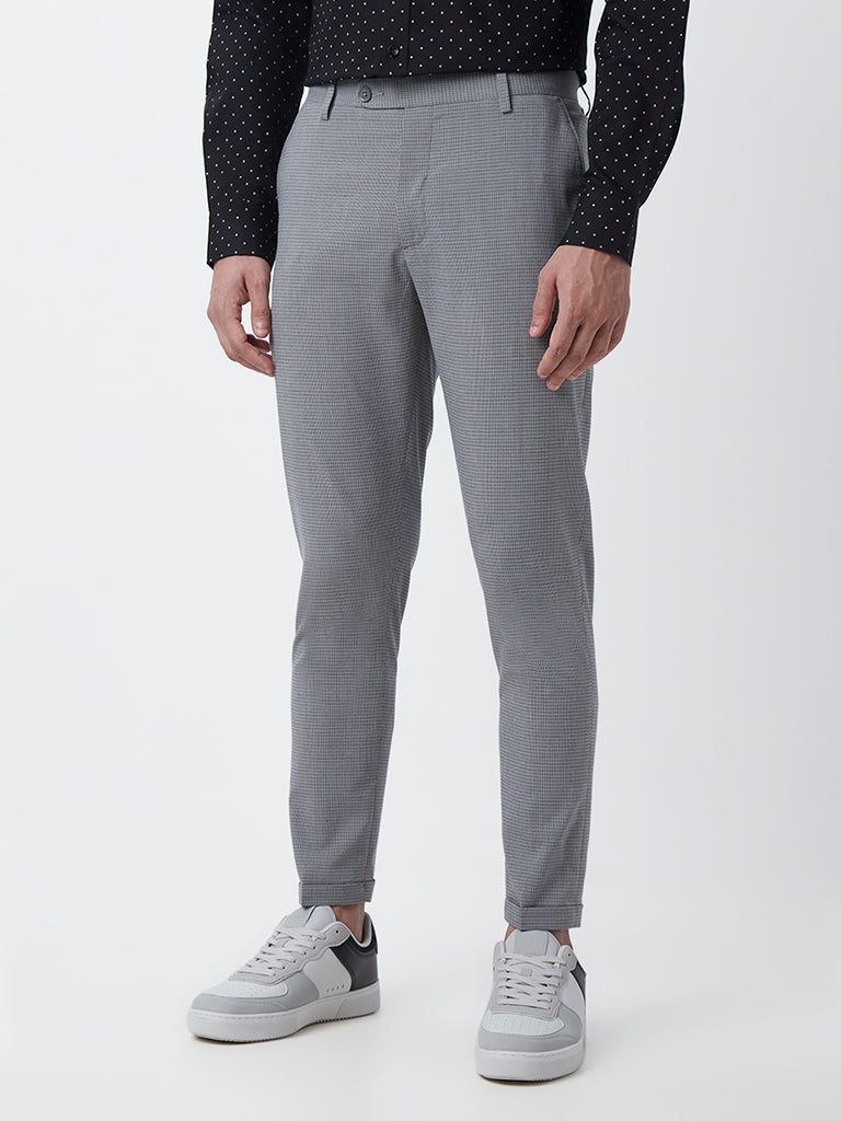 Shop WES Formals Grey Striped Carrot-Fit Trousers Online – Westside